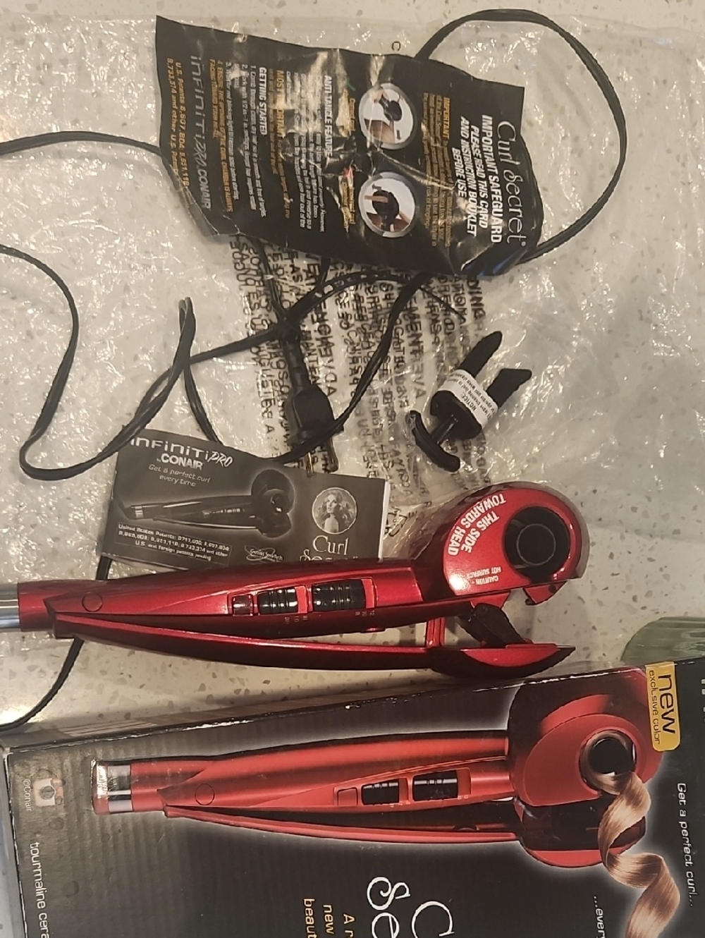USED. Conair InfinitiPro Curl Secret Auto-Curling Iron - Red